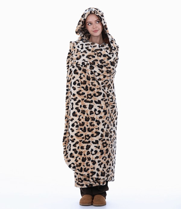 Soğuk kış günlerinde ev keyfini ikiye katlayan yumuşacık giyilebilir battaniye.