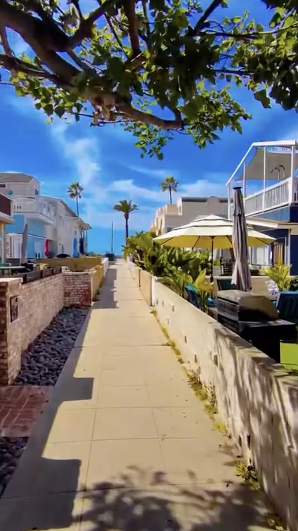 The content creator, serving as a guide to the ocean, articulated that the residents of this street could enjoy a bike ride, cruise around on rollerblades or skateboards, and with a short stroll, they could find themselves by the sea.