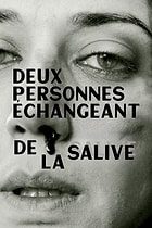 Deux personnes échangeant de la salive