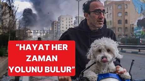 İran'da Hayat Devam Ediyor: Bisikleti ve Köpeğiyle Hayata Tutunan Adam Objektiflere Yansıdı