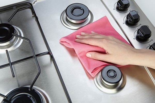 There's also an easy method to clean the grease off your stove.