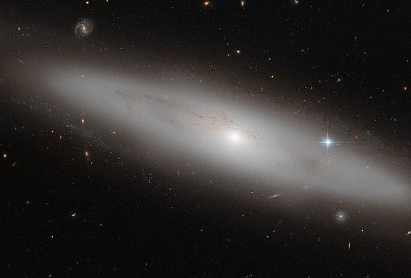 The issue of "missing mass" in galaxy clusters, first identified by Fritz Zwicky in 1933, gained clarity in the 1970s when Vera Rubin measured the rotational speeds of stars in spiral galaxies.