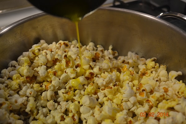 When corn is heated, the internal temperature begins to transform moisture into steam once it reaches 100°C.