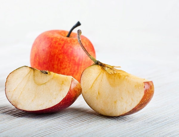 The rate at which an apple browns is influenced by factors such as its level of ripeness, storage conditions, and even the season.
