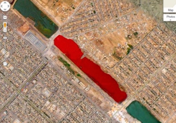 A lake appearing blood-red in Iraq has drawn attention.