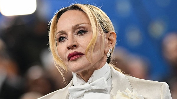 Madonna hangi filmdeki rolüyle Altın Küre'de En İyi Kadın Oyuncu ödülünü kazanmıştır?