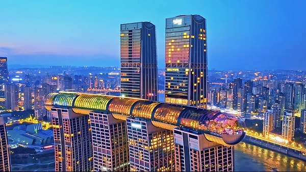 This sky bridge is also home to massive rooftop gardens, upscale restaurants, bars, event spaces, a private club, and two 50-meter-long infinity pools that offer a swimming experience in the sky.