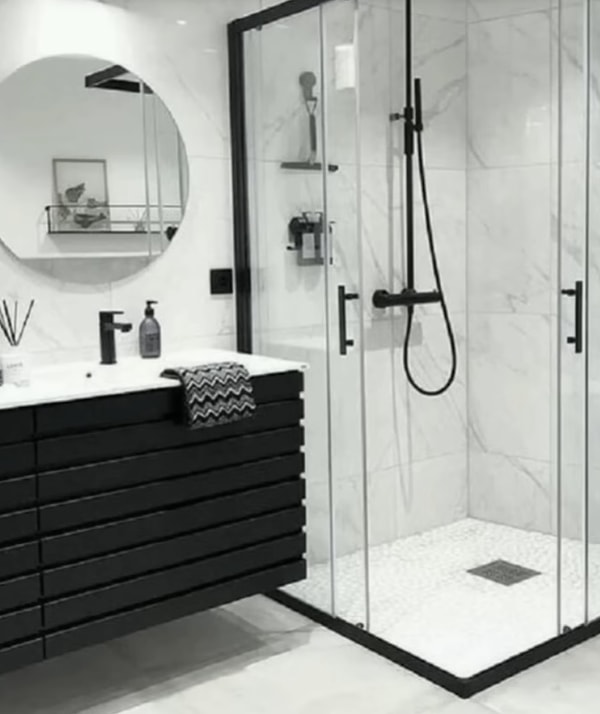 There's no need to knock down walls and undergo a complete renovation to make your bathroom appear larger and more luxurious in 2026.