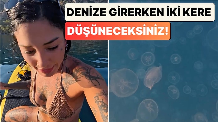 Bir Kadın Ölüdeniz'in Berrak Sularını Kaplayan Denizanalarının Oluşturduğu Görsel Şöleni Paylaştı