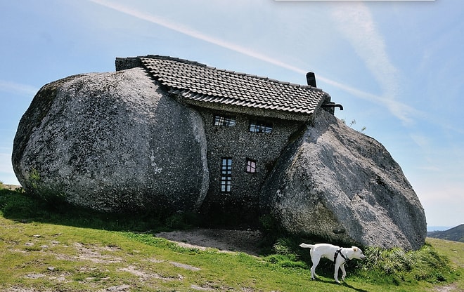 Remote Stone House Built Between Four Boulders Gets 400kg Door to Keep Tourists out