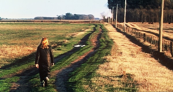 Los Rubios / The Blonds (2003) is a film that delves into the haunting past of Argentina's Dirty War. The film's director, Albertina Carri, uses a mix of animation and live-action sequences to tell the story of her parents, who disappeared during the military dictatorship. The film is not just a personal journey, but also a commentary on memory, identity, and the impact of political violence on individual and collective psyches.

In the film, Carri employs a unique narrative style, combining documentary and fictional elements to challenge the conventional ways of representing history and memory. She uses dolls and miniature sets to re-enact the events, creating a surreal and disturbing atmosphere that reflects the trauma and confusion of the period. Moreover, she includes interviews with people who knew her parents, adding a layer of objectivity to the subjective narrative.

The film is a powerful exploration of the lingering effects of political violence and the struggle to come to terms with a traumatic past. It raises important questions about the nature of memory and the role of personal narratives in shaping our understanding of history. It is a poignant reminder of the human cost of political violence and a testament to the resilience of the human spirit in the face of adversity.

In conclusion, Los Rubios / The Blonds (2003) is a film that pushes the boundaries of the documentary genre, offering a fresh and innovative approach to dealing with historical trauma. It is a deeply personal and profoundly moving film that leaves a lasting impression on the viewer.