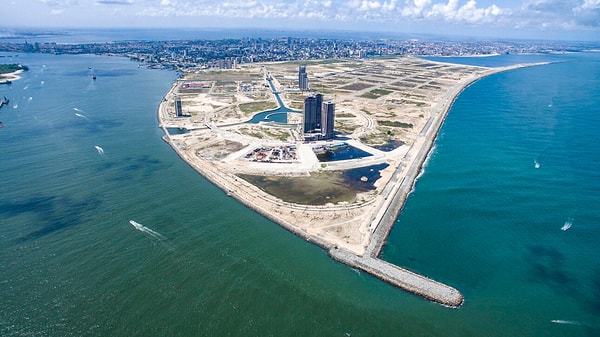 The sea wall, stretching 8.4 kilometers, will serve as a protection for the city.