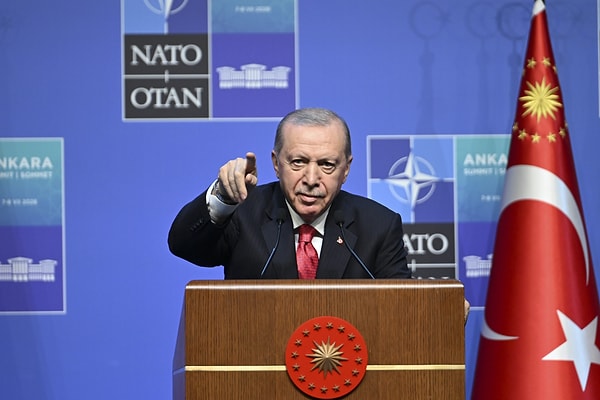 Why did Erdogan give a gun as a gift?