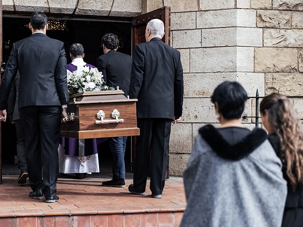 The empty coffin and missing documents exposed his plan.