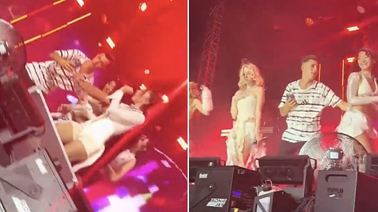 Stage Intrusion: Security Intervenes as Fan Jumps on Stage During Manifest Concert