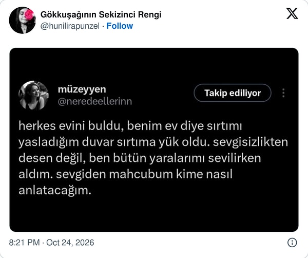 Evi bulanların arasında duvara yaslanmış biri