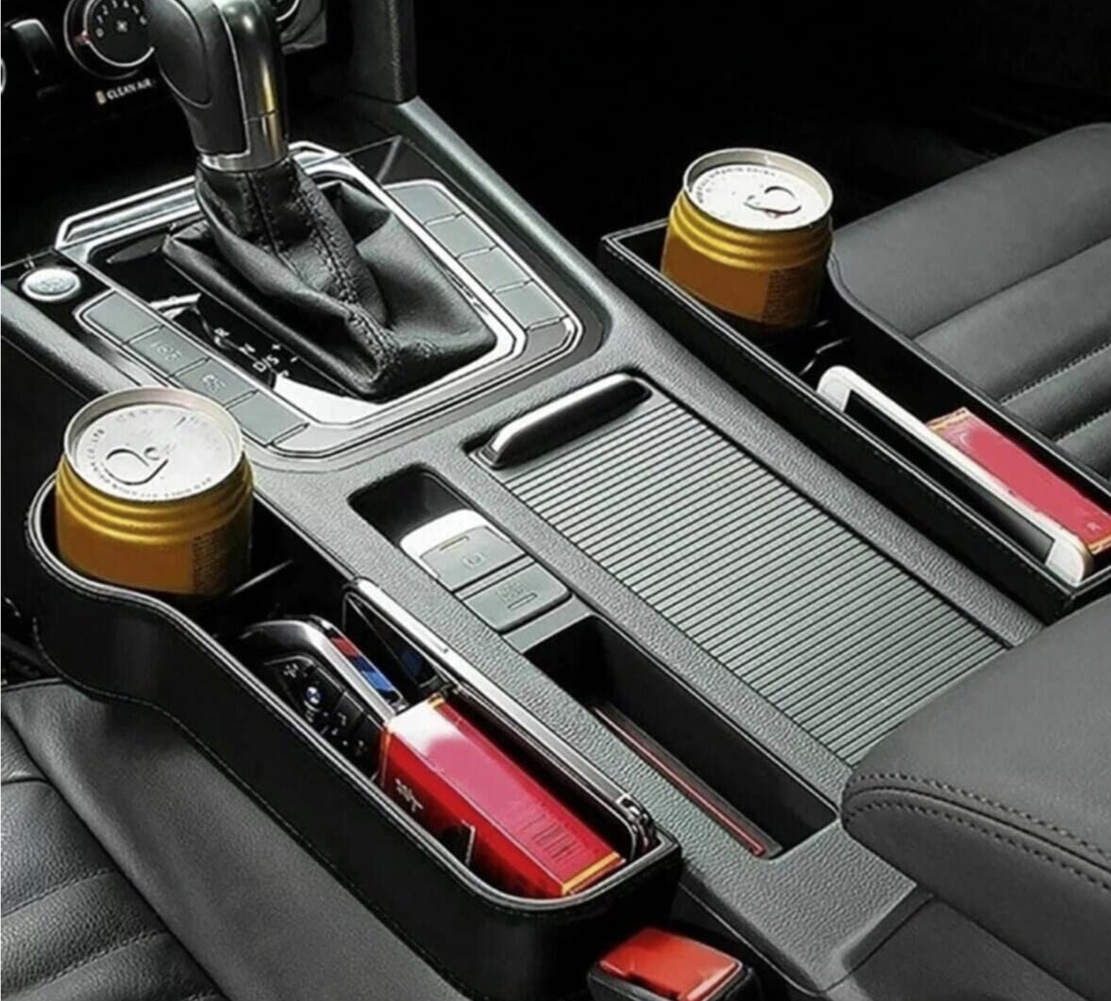 Seyahatlerinizi bir üst seviyeye taşıyacak olan Oto Koltuk Arası Organize Bardaklık ve Telefon Tutucu ile tanışın!